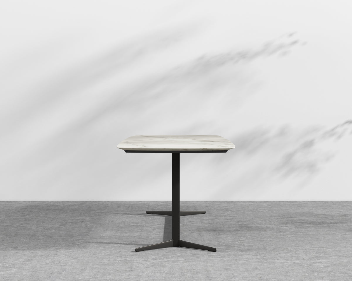 Elaine Dining Table - White Calacatta Ceramic with Tempered Glass, Black Base, 95"